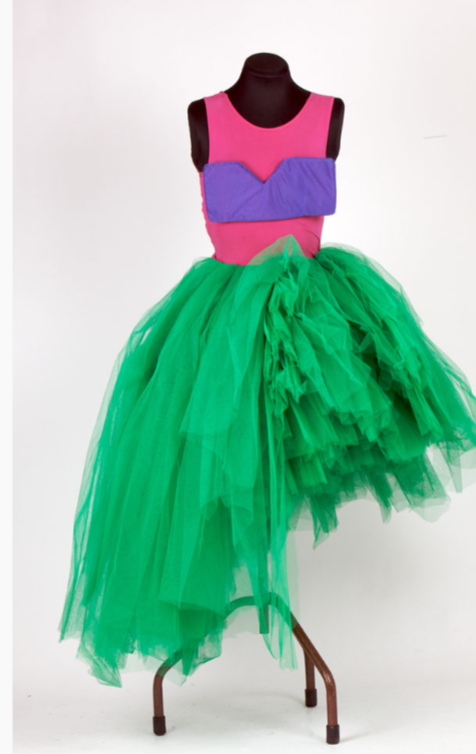 A green and purple tutu dress on a mannequin.