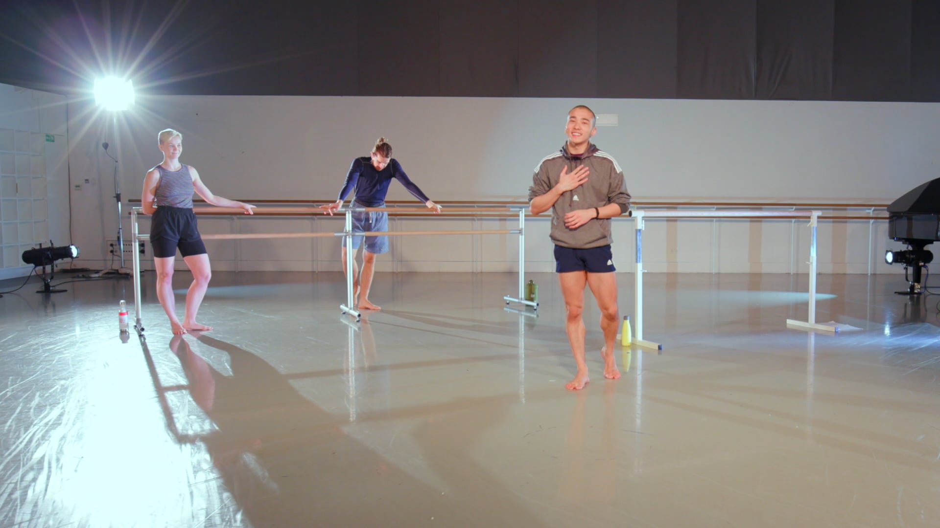 a group of people that are standing in a room.