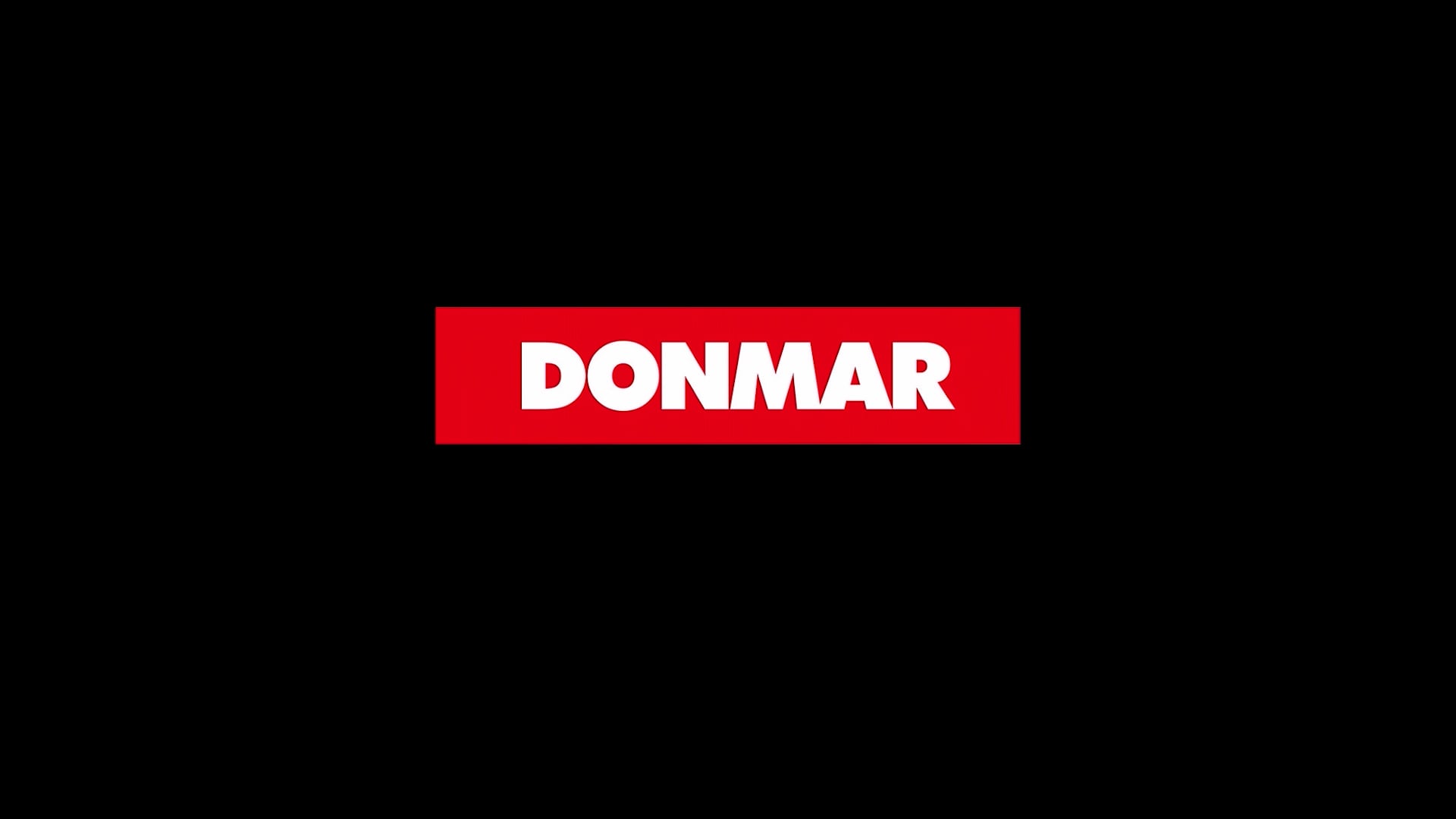 a red box with the word donmar on it.