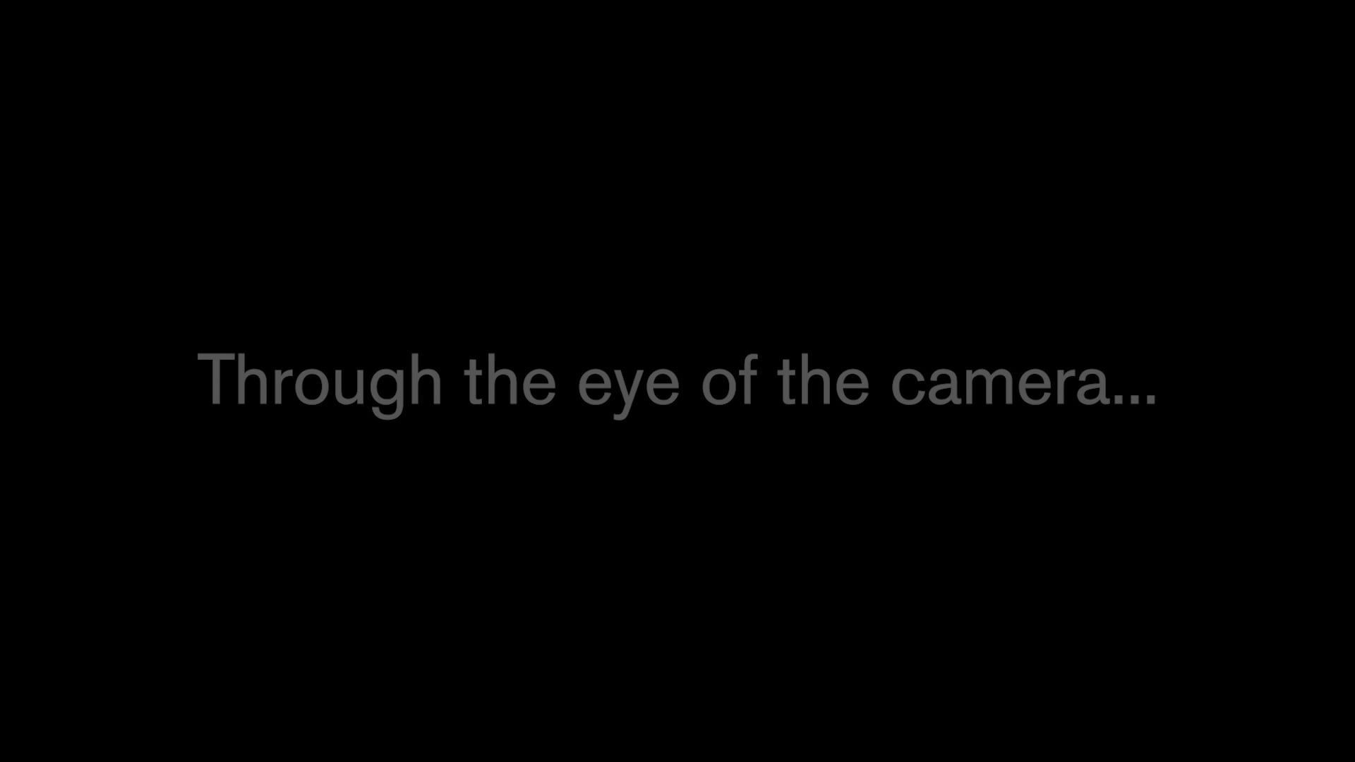 a black background with the words through the eye of the camera.