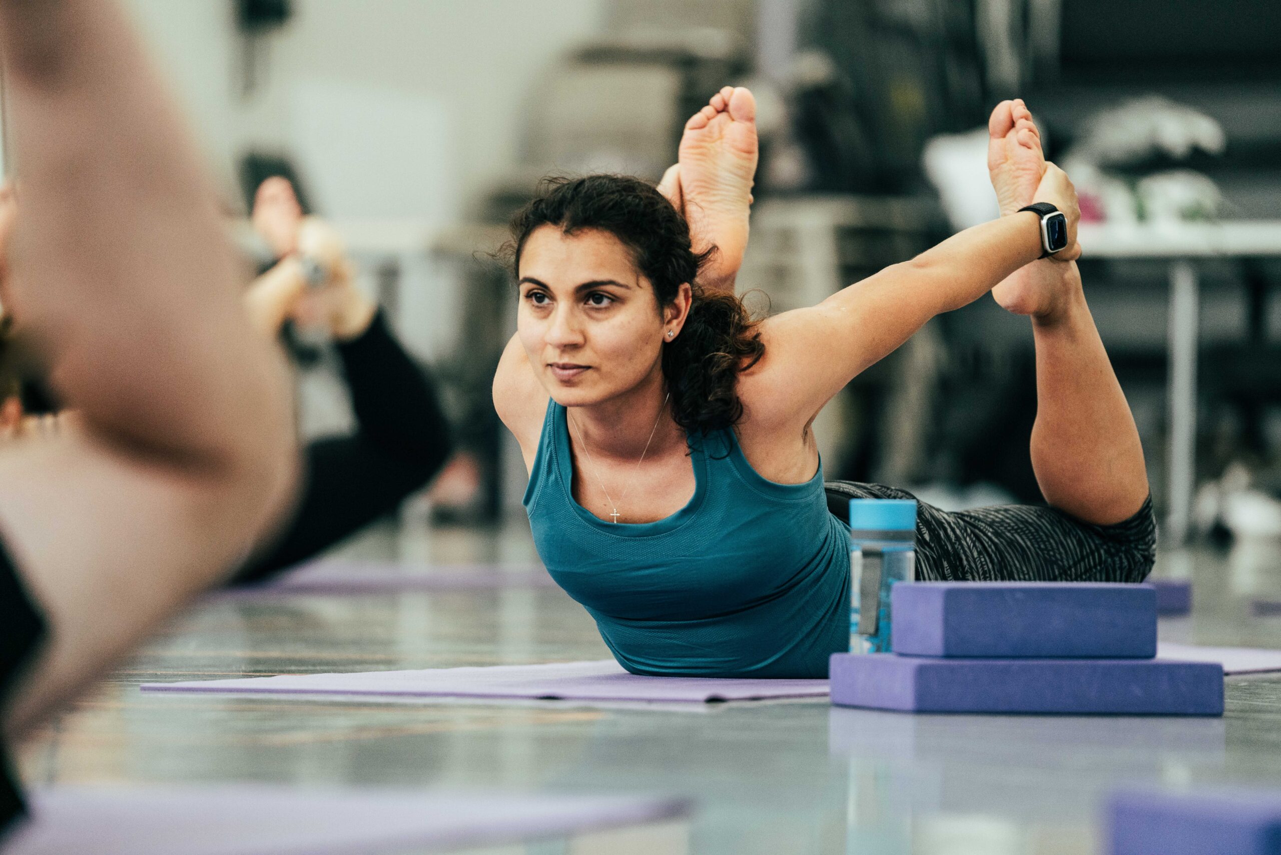 Person doing yoga with blocks